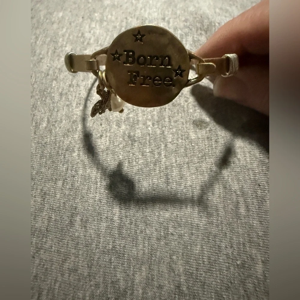 Gold 'Born Free' Bracelet with Charms
